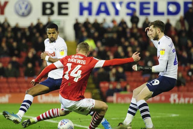 Tom Barkhuizen fires Preston in front against Barnsley, watched by Scott Sinclair