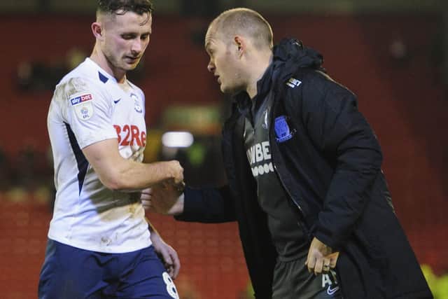 Preston midfielder Alan Browne gets a handshake from Alex Neil at the final whistle at Barnsley