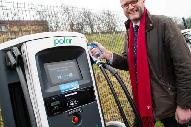 Lancaster City Coun John Reynolds at the new electric vehicle charging hub in Lancaster