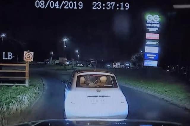 An oncoming HGV can be seen flashing its headlights before Lowe turns her car sharply to the left to rejoin the motorway in the right direction. (Credit: Lancashire Police)