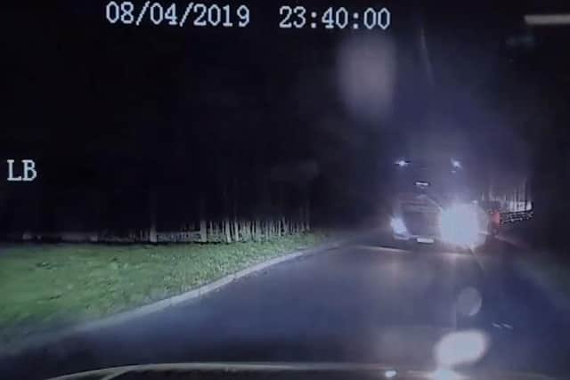 An oncoming HGV can be seen flashing its headlights before Lowe turns her car sharply to the left to rejoin the motorway in the right direction. (Credit: Lancashire Police)