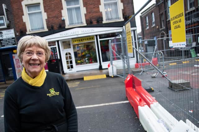 Florist Margaret Mason is urging shoppers to return saying "Friargate is still open for business."