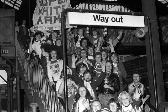 PNE fans at Preston Station on their way to Crewe for the first of three FA Cup meetings in November 1976
