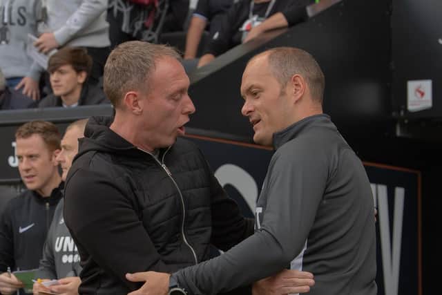 Swansea head coach Steve Cooper and Preston manager Alex Neil shake hands at the Liberty Stadium earlier in the season
