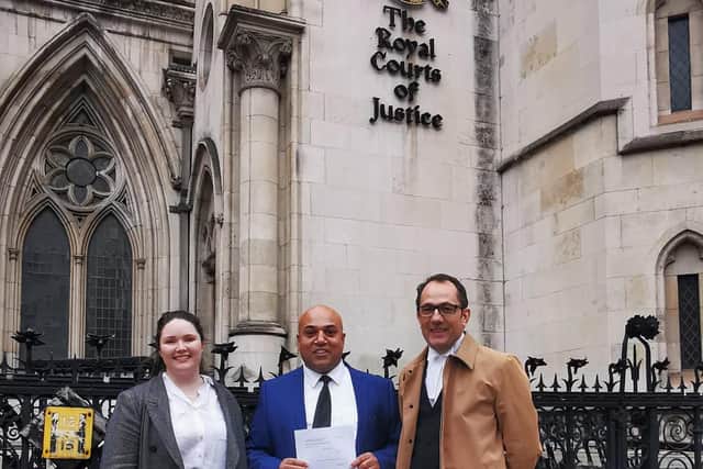 Wajed Iqbal (centre) with William Bennett QC and Megan Tolkien of patron Law.