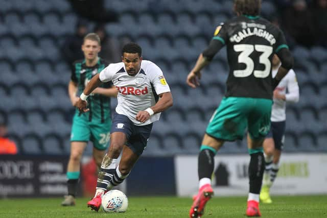 Preston winger Scott Sinclair runs at the Swansea midfield