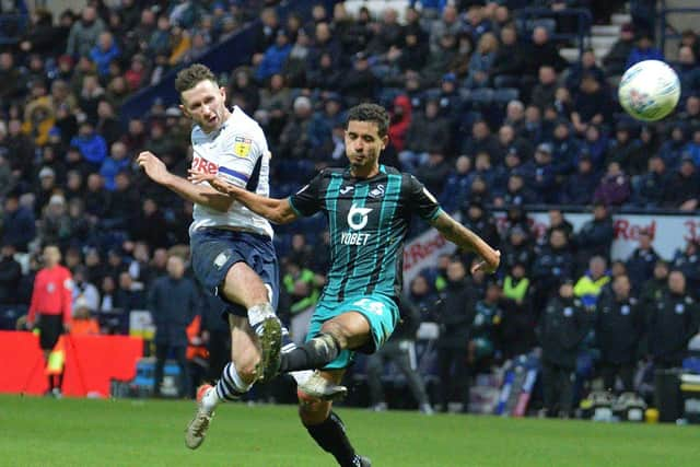 Preston skipper Alan Browne fires a late shot over the bar against Swansea