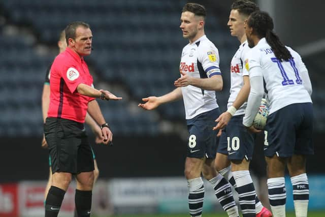 Alan Browne, Josh Harrop and Daniel Johnson make their point to referee Geoff Eltringham