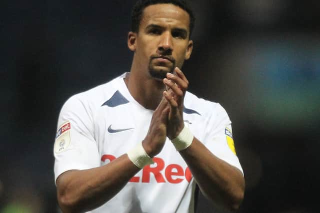 Scott Sinclair applauds the Preston supporters after scoring his first goal in a PNE shirt