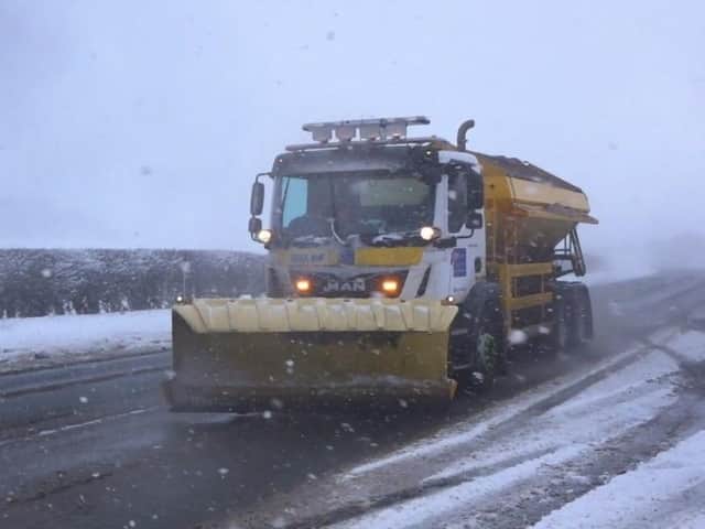 A gritter in action
