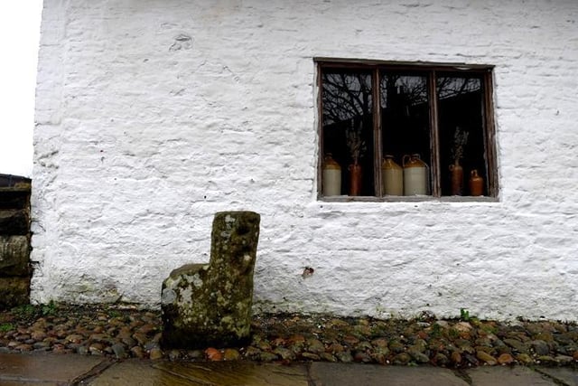 Mounting block situated to the south side of Church Cottage Museum
