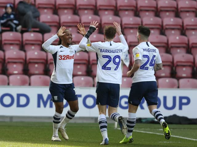 Daniel Johnson celebrates scoring Preston's second goal at Wigan