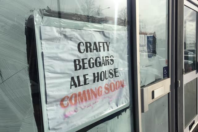 The new Crafty Beggars Ale House has a sign on the window saying 'coming soon'