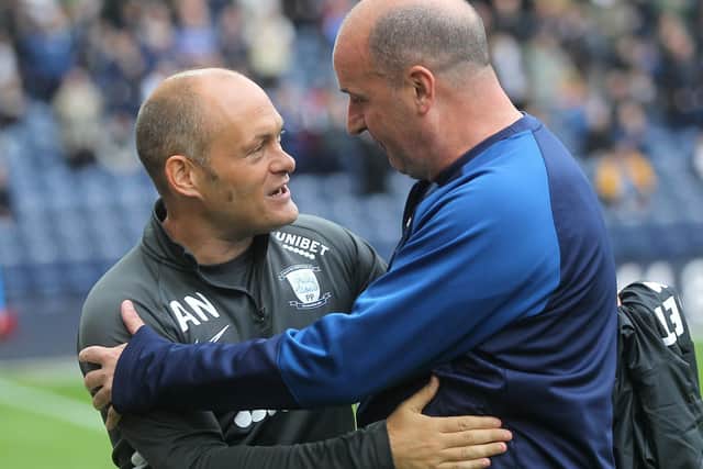 Preston manager Alex Neil and his Wigan counterpart Paul Cook
