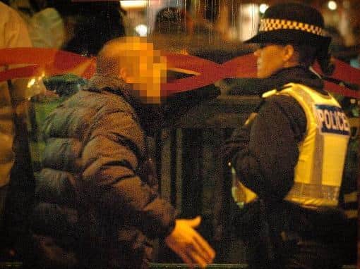 A reveller in Blackpool exchanges heated words with a police officer in a 2011 file photograph (Picture: JPIMedia)