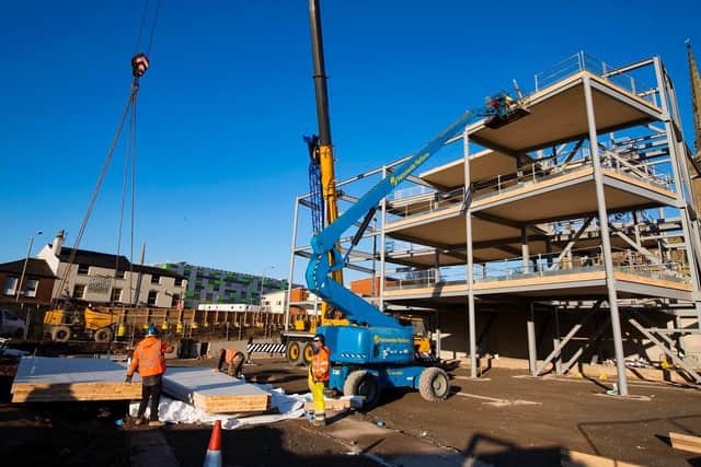 Steels for the new Student Centre at UCLan are lifted into place by mobile cranes
