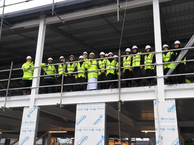Staff and pupils were given a tour of the new building at Preston Muslim Girls High before they buried a time capsule for posterity