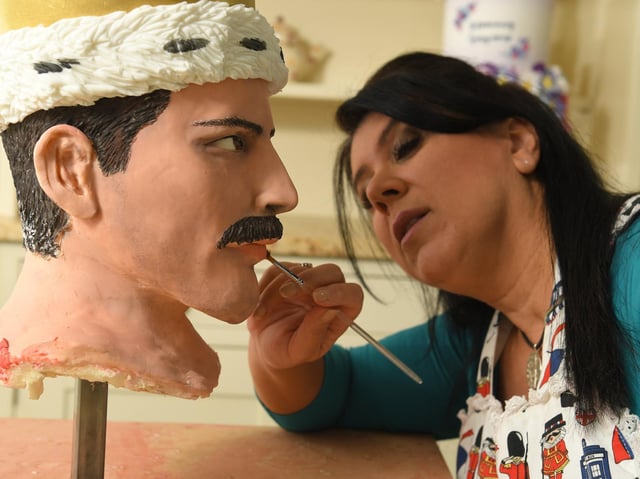 Rosie creates a look-alike Freddie Mercury out of cake