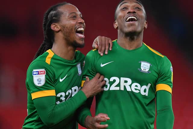 Daniel Johnson and Darnell Fisher at the final whistle of PNE's 2-0 win at Stoke