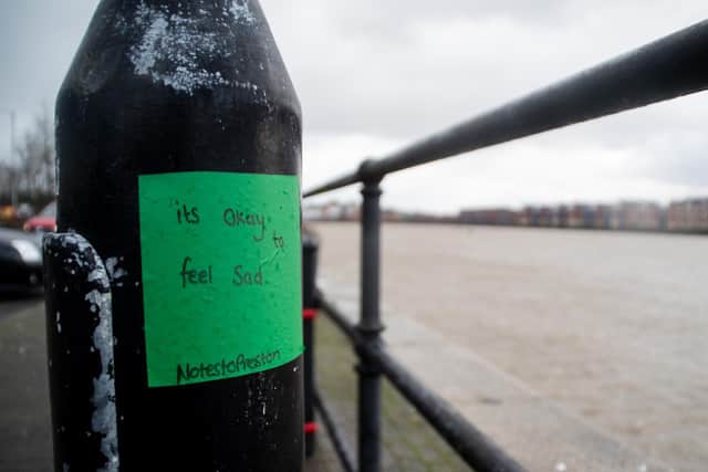 "It's OK to be sad", reads a note next to the basin at Preston Docks.