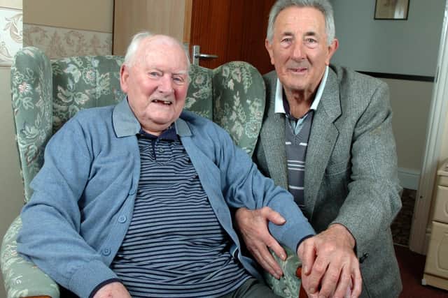Sir Tom aged 90 with former team-mate Eric Jones