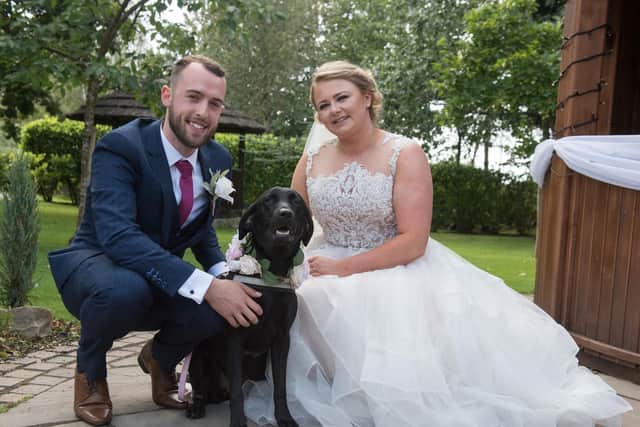 Conor and Katie Holgate with their dog Luna