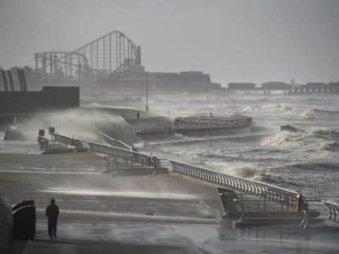 The Met Office have issued an amber rain warning for parts of Lancashire this weekend. (Photo by OLI SCARFF/AFP via Getty Images)
