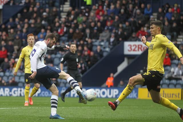 Tom Barkhuizen has a shot for Preston against Millwall at Deepdale