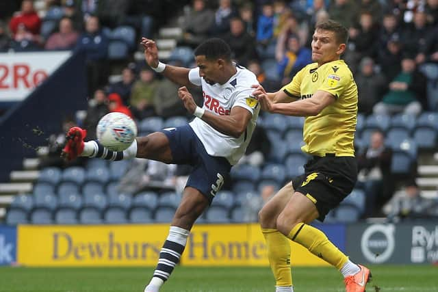 Preston winger Scott Sinclair holds off Millwall's Shaun Hutchinson