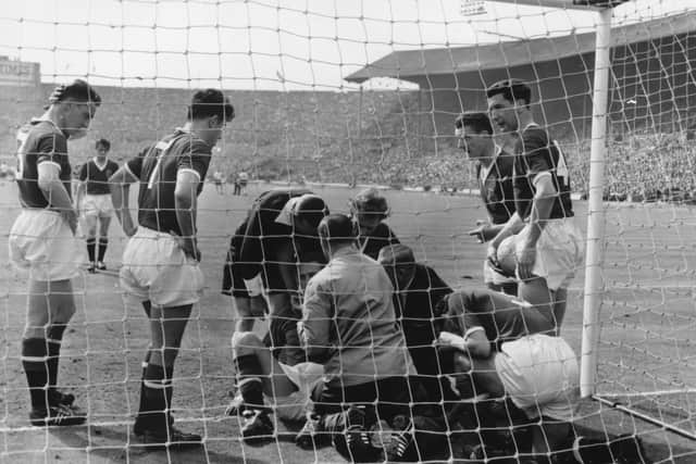 Harry Gregg was left unconscious when Nat Lofthouse scored the second goal for Bolton Wanderers in the 1958 FA Cup final.  (Getty Images)