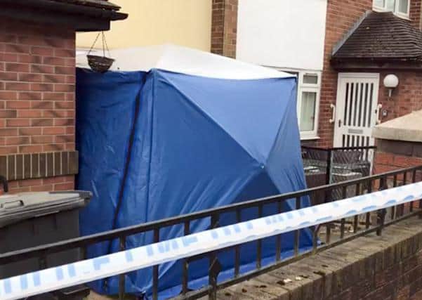 The house was taped off by police and a forensic tent was set up in front of the property.
