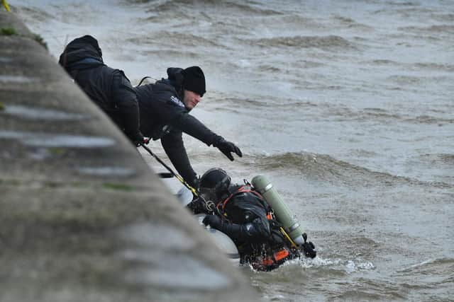 Police divers searching Preston dock