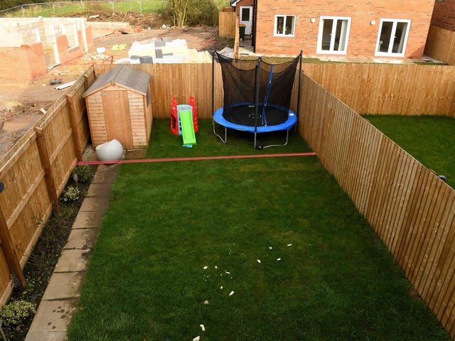 Pam Unsworth's back garden in Cottam with the red line showing where the new fence will be.