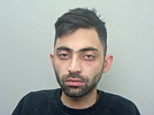 Mohammed Rehan Awan (pictured) is described as around 175cm tall, of slim build, with short black hair, and a full beard and moustache. (Credit: Lancashire Police)