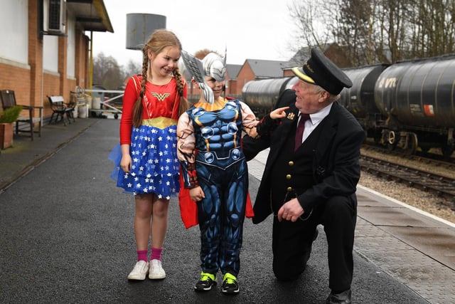 Superhero day at Ribble Steam Railway and Museum.
Rosie and James Yarrow with Station Master Dave Crosby.