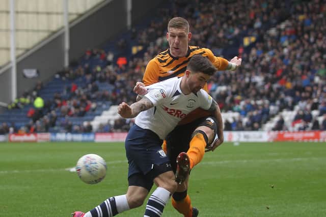 Preston's Sean Maguire challenges for the ball against Hull at Deepdale
