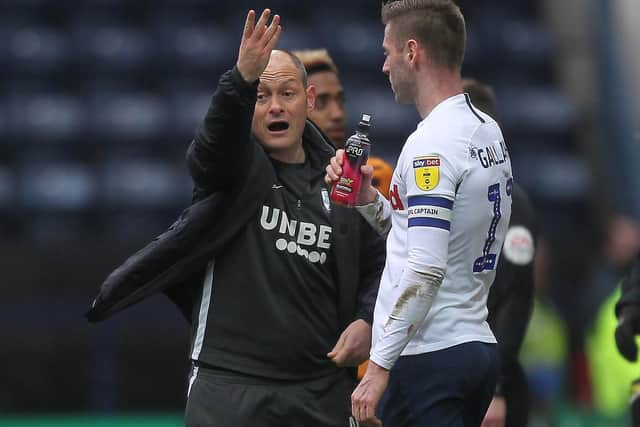 PNE manager Alex Neil gives instructions to Paul Gallagher