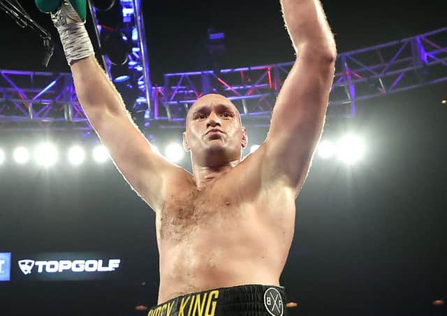 Tyson Fury celebrates after knocking down Deontay Wilder at the MGM Grand Garden Arena (Getty Images)