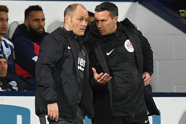 Preston manager Alex Neil has a word with fourth official Dean Whitestone
