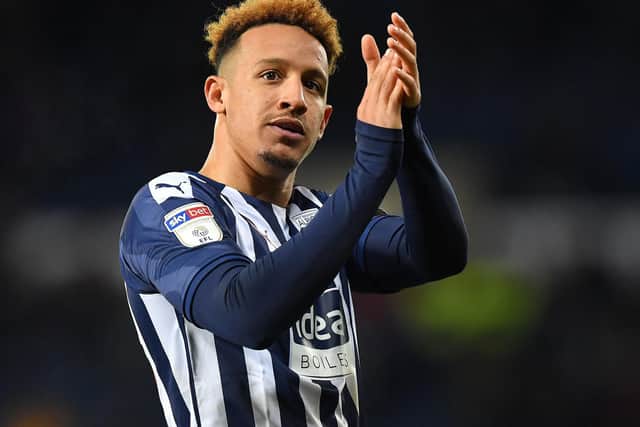Former PNE attacker Callum Robinson leaves the pitch after being substituted