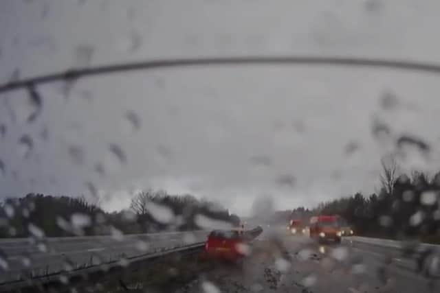 A red Nissan Micra lost control and skidded backwards at speed into the central reservation along a stretch of the M61. (Credit: Highways England)