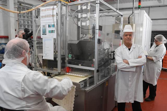 Chairman Andrew Whiting on the factory floor