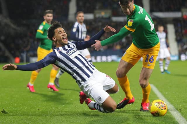Preston left-back Andrew Hughes in action against West Bromwich Albion at The Hawthorns