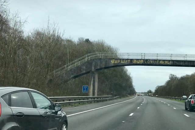 Graffiti targeting middle-lane hoggers has been scrawled on motorway bridges along a stretch of the M6 near Preston. (Photo by @QuarkMcMalus)