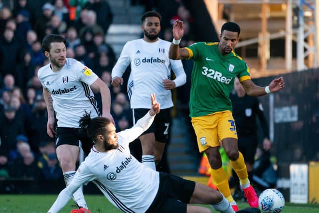 PNE substitute Scott Sinclair is tackled by Fulham centre-half Michael Hector