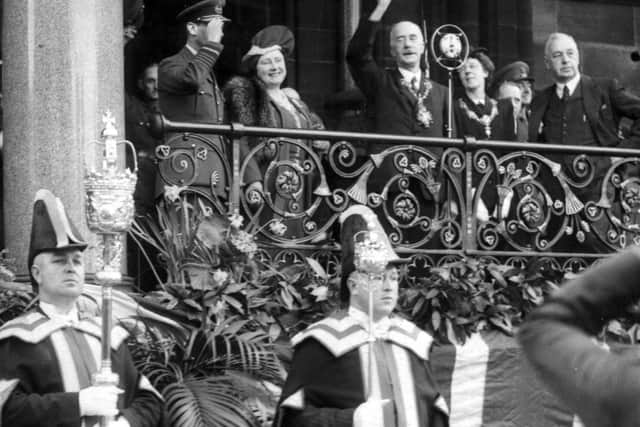 King George VI and Queen Elizabeth greet the crowds from Preston Town Hall