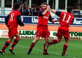Preston striker Tony Lormor celebrates scoring on his debut against Luton with fellow scorers David Eyres (No.11) and Lee Ashcroft (No.8)