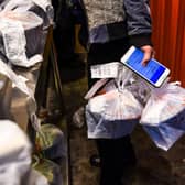 Couriers are classed as self-employed and are not usually entitled to statutory sickness or holiday pay (Pic:CHANDAN KHANNA/AFP via Getty Images)