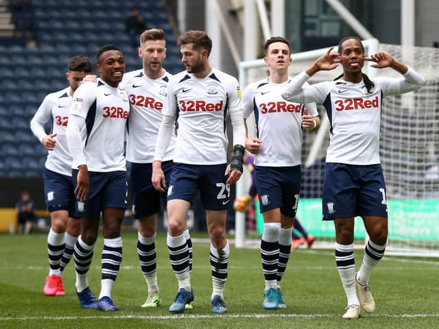 Preston players celebrate after Daniel Johnson scores from the penalty spot against QPR at Deepdale