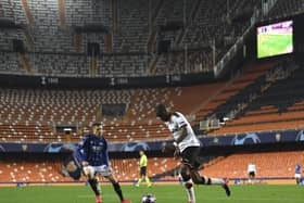 Valencia’s Geoffrey Kondogbia (right) with Atalanta’s Josip Ilicic during Tuesday night’s Champions League tie played in an empty stadium because of the coronavirus outbreak
